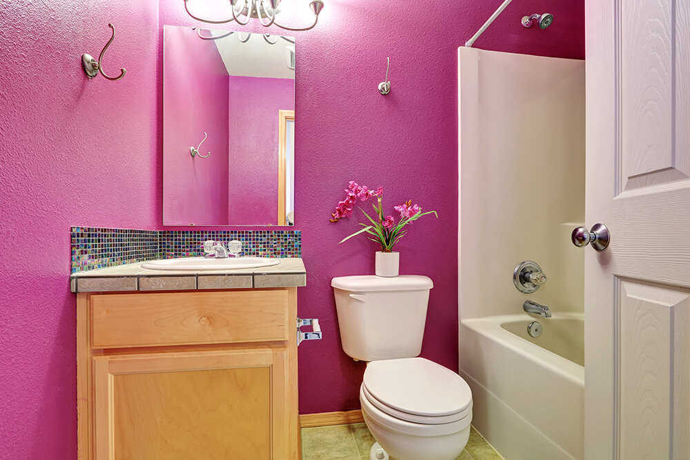 Pink Bathroom Decor with Gold Brassware and Mirror